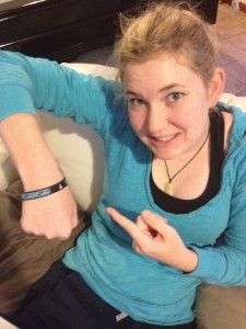 Ashleigh wearing her custom Mediband — epilepsy and drug allergy ID