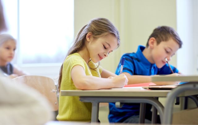 Kids wearing medical ID bracelets at school for back-to-school safety