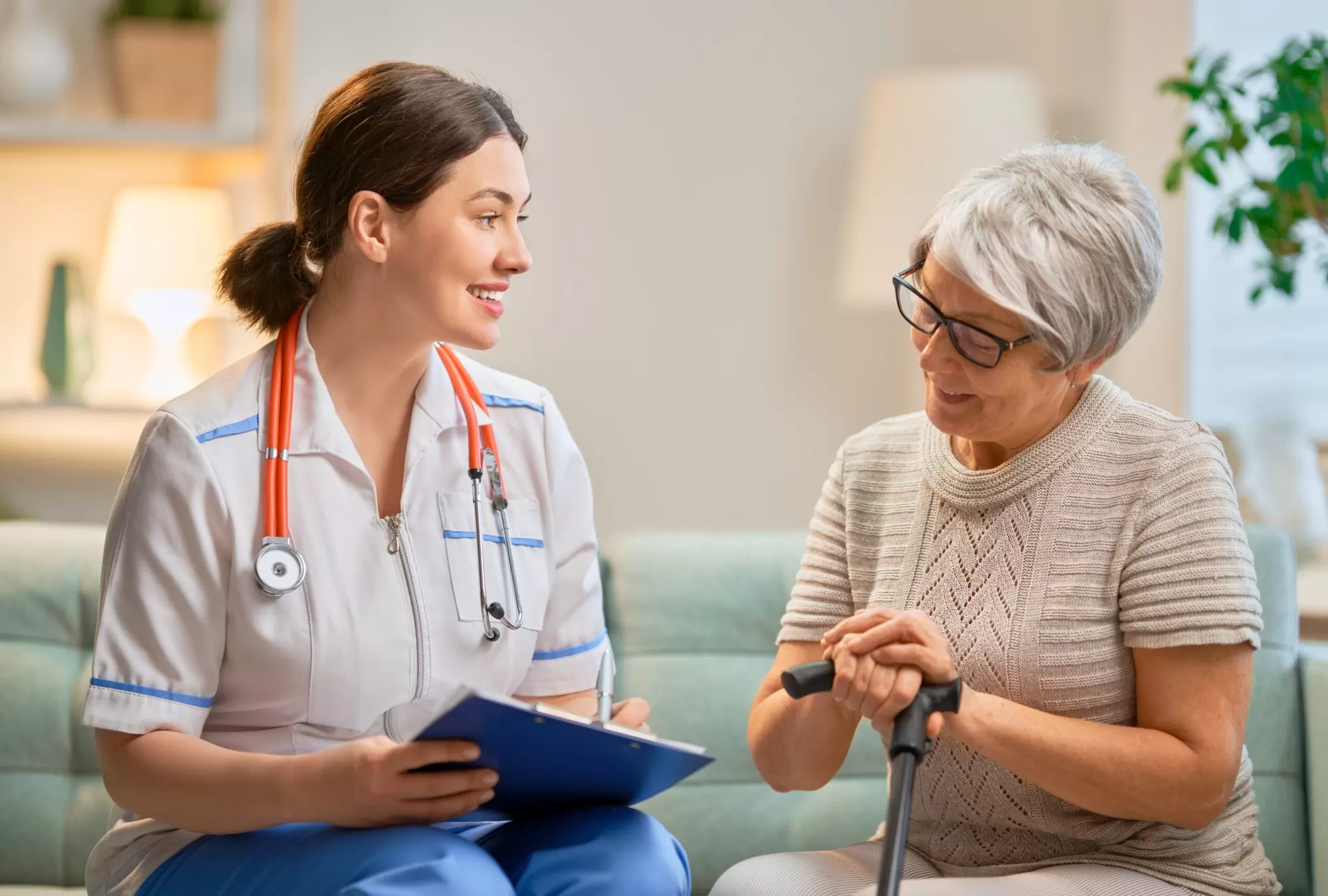 Caregiver and elderly Alzheimer's patient — hospital wristband advocacy