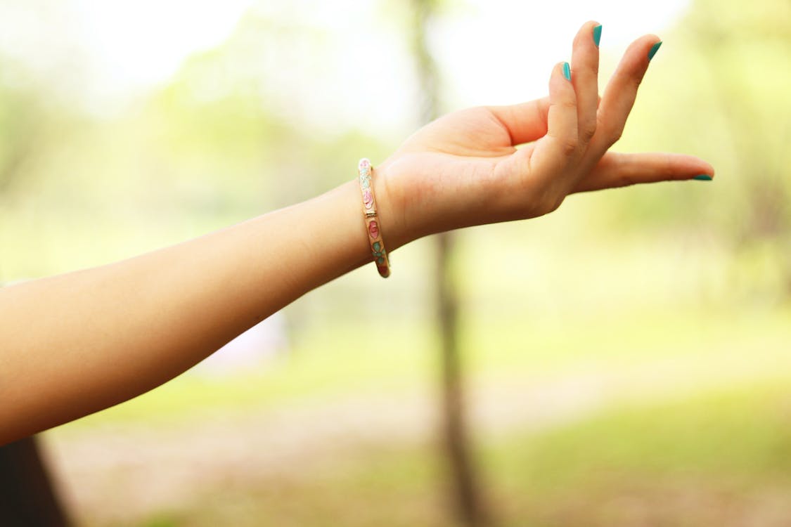 Person wearing a wristband — medical alert wristbands provide vital information in an emergency