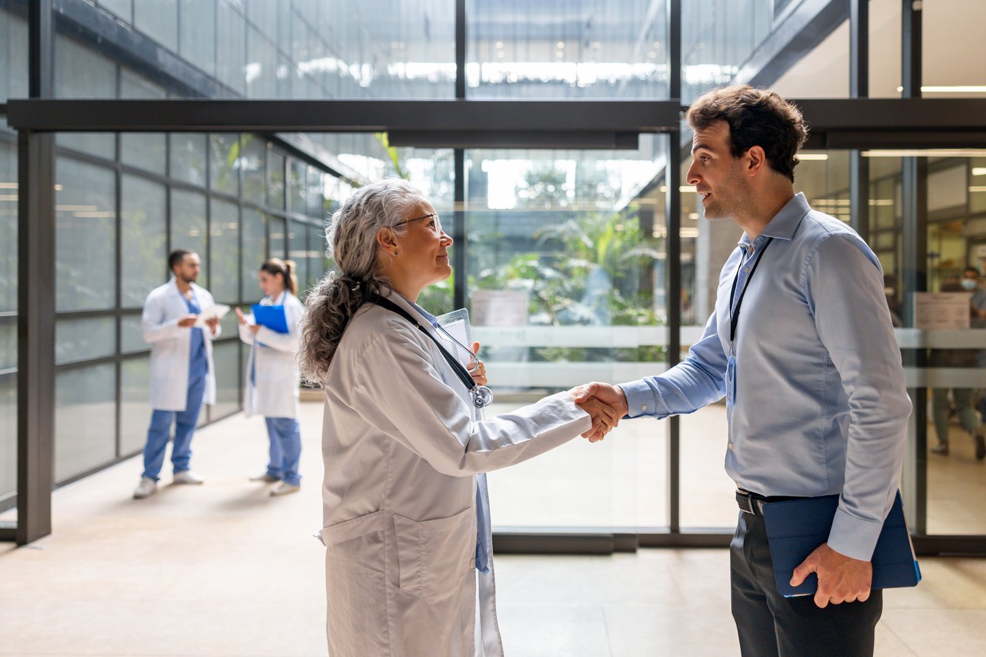 Two generations holding hands — Mediband partnerships across generations