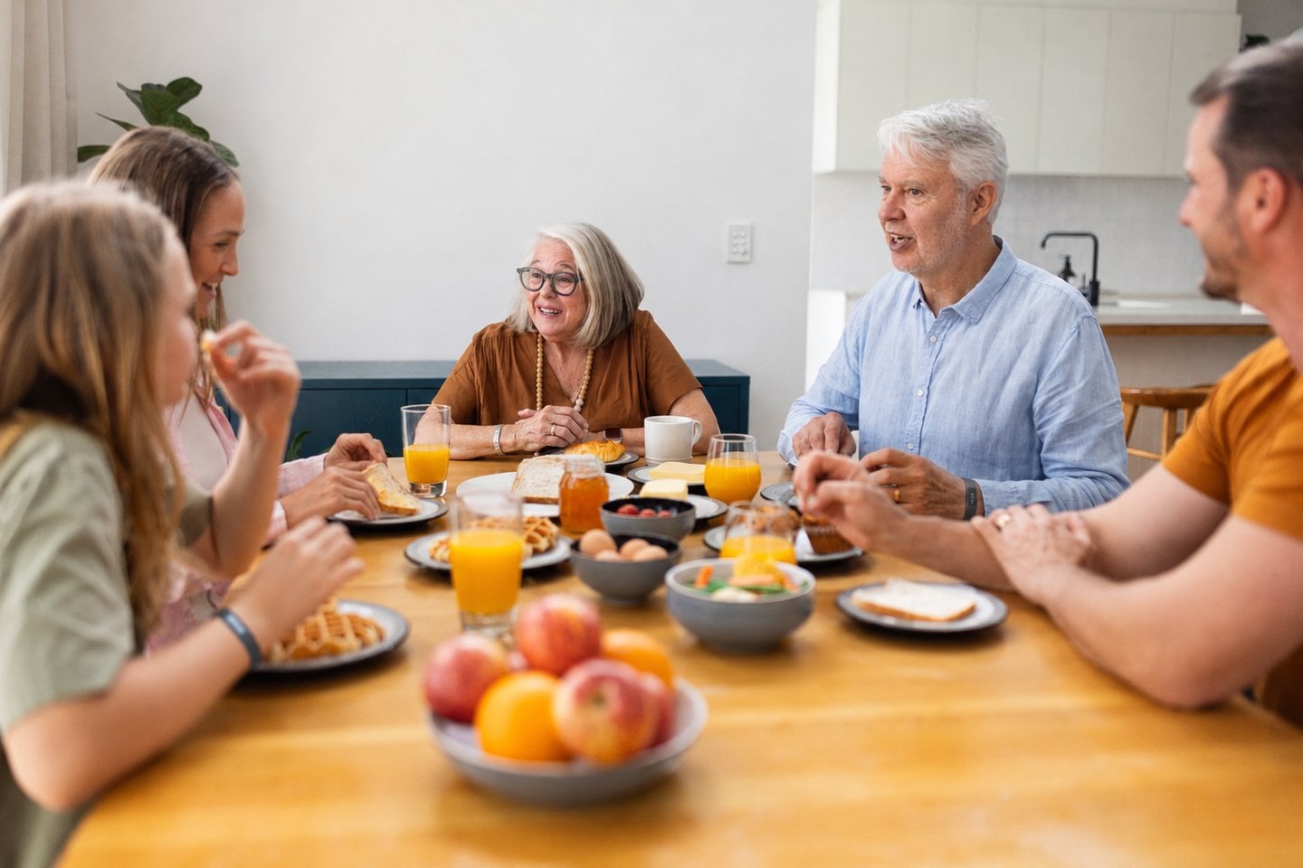 Three-generation Australian family at a sunny kitchen breakfast — Mediband medical ID resources for every age and condition Three-generation Australian family at a sunny kitchen breakfast — Mediband medical ID resources for every age and condition