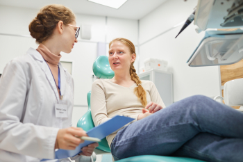 Patient discussing medical procedure with doctor — what to do after a medical diagnosis in Australia