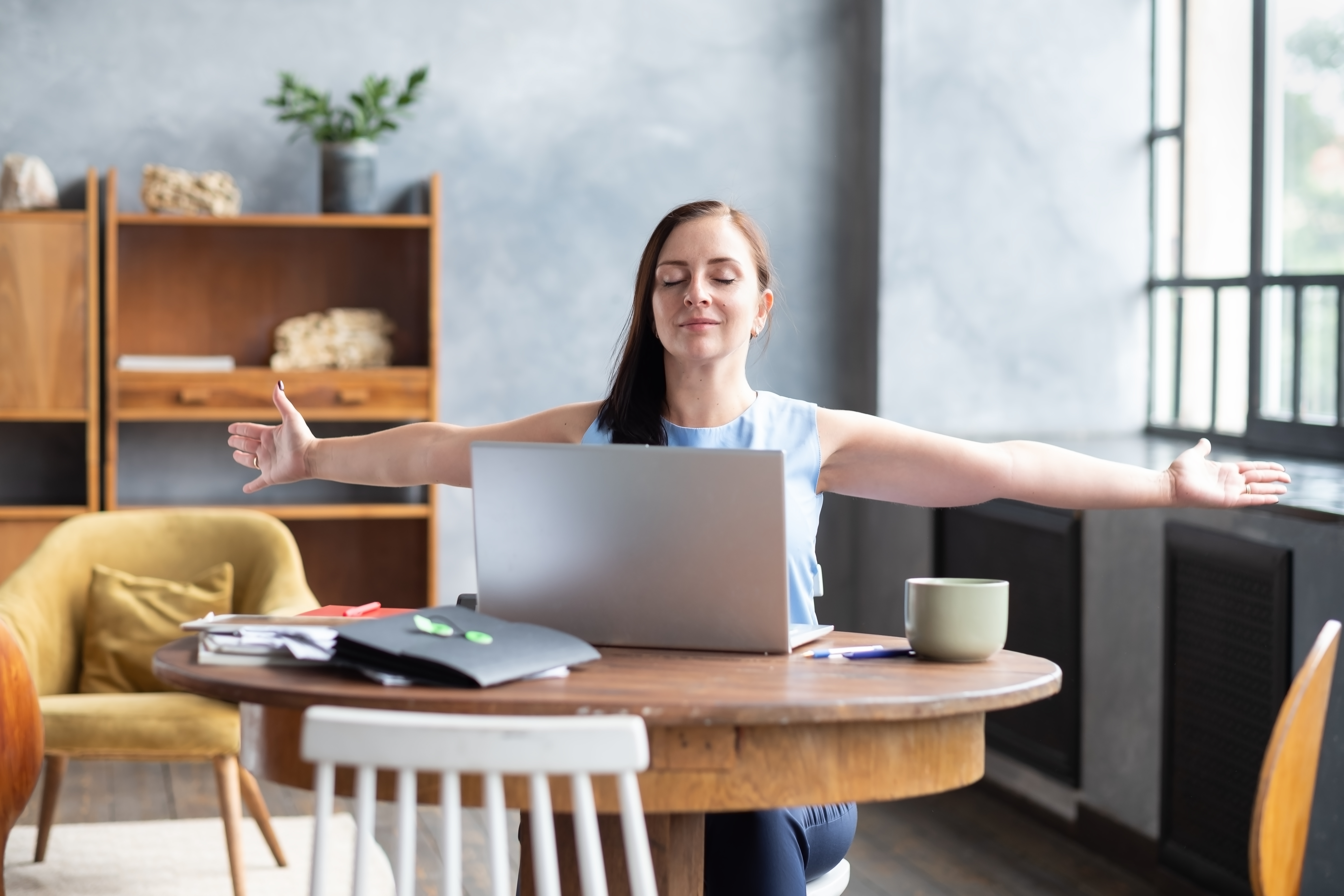 Woman stretching during preventative health and wellness routine