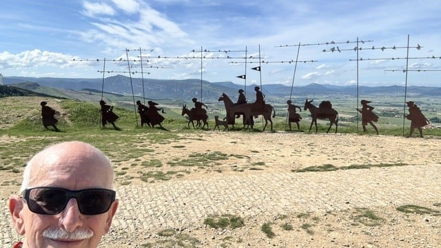 Ron at the Alto del Perdon pilgrim monument on the Camino de Santiago, wearing his Mediband medical alert bracelet