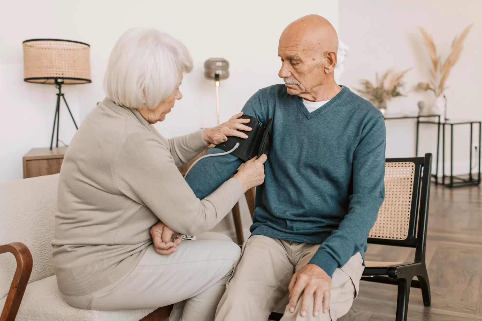 Understanding blood pressure readings — person checking blood pressure with medical alert bracelet